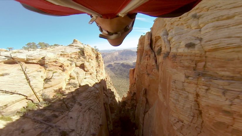 Marshall Miller Flies Through A Narrow Canyon