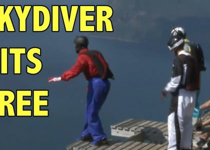 Wing Suit man Parachute fails into tree